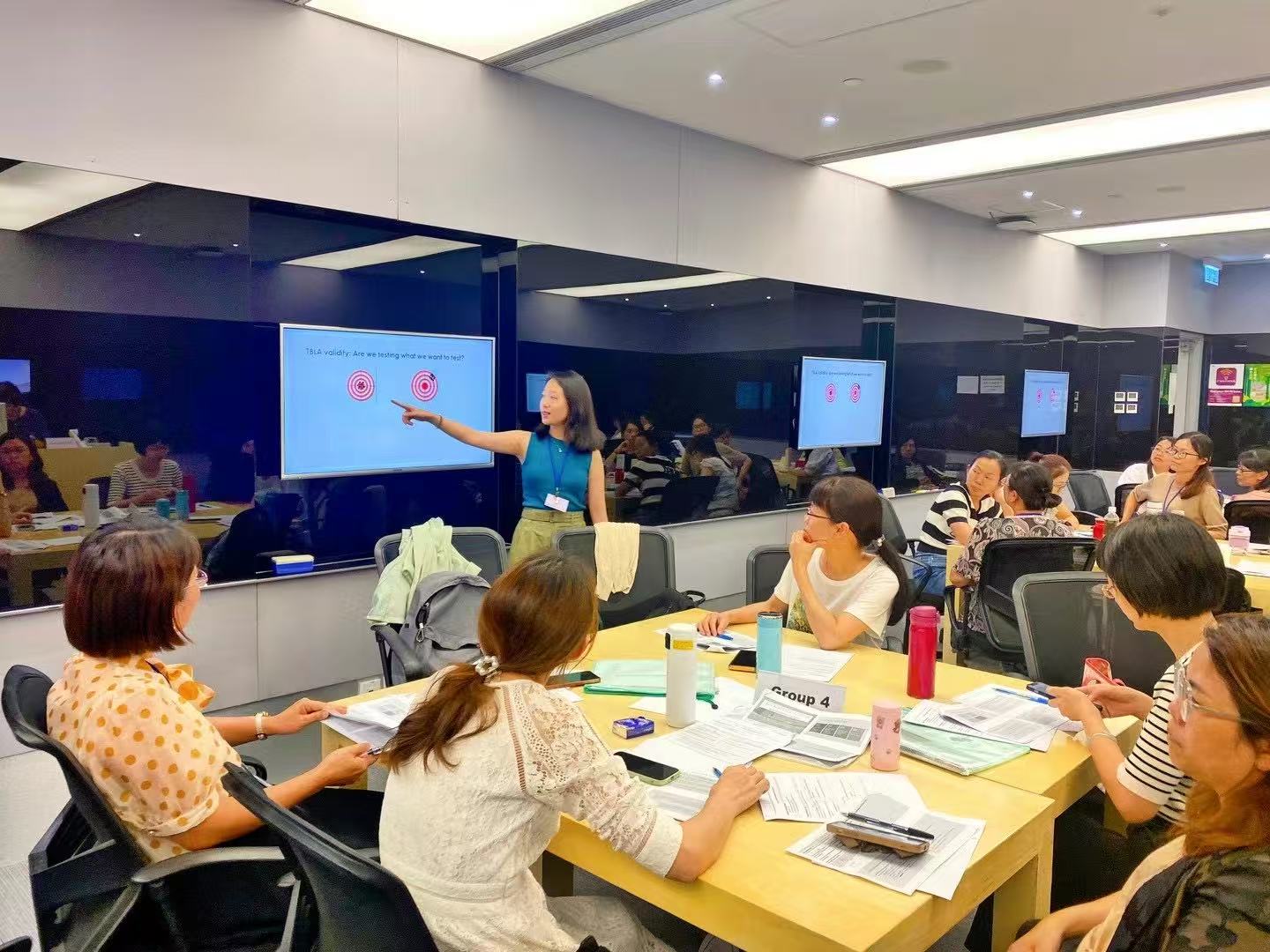 Sihan Zhou teaching in a classroom